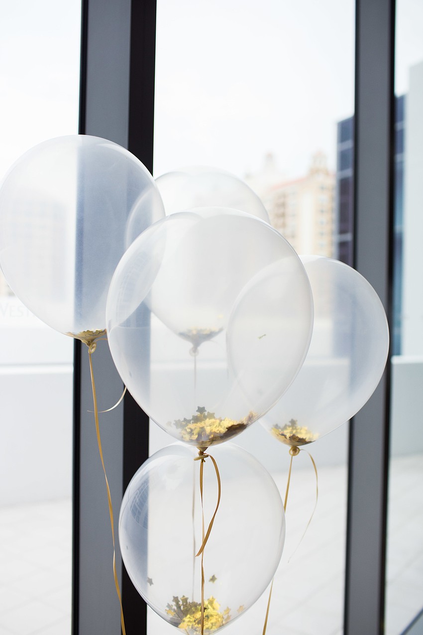 Balloons with gold confetti decorated the halls of The Westin Sarasota.