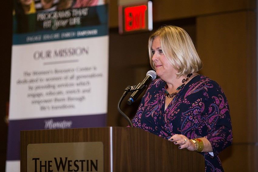 Chairwoman Jamie Aymerich welcomes guests.