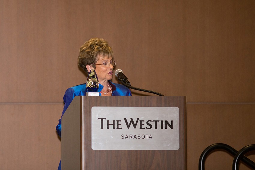 Honoree Janice Zarro tells a story about WRC in her speech.