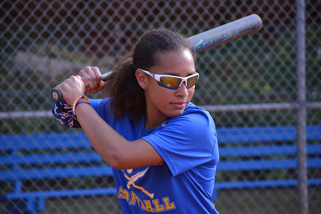 McKenzie Clark takes her batting stance at Blazers practice.