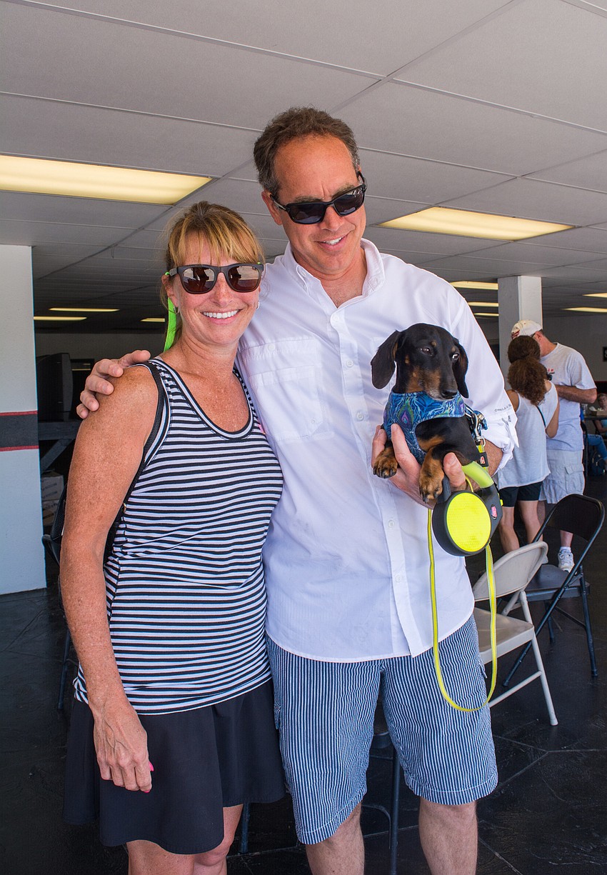 Mary and Bryan Scheible with their pooch Molly.