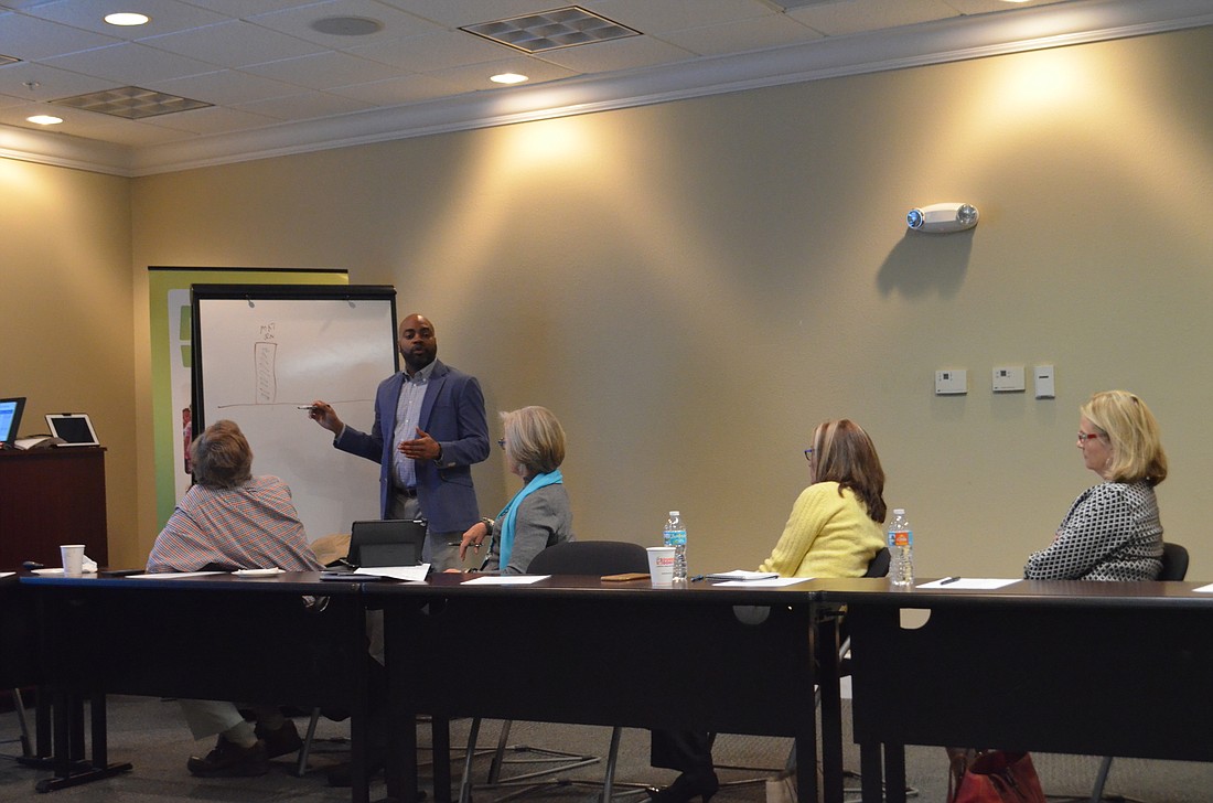 Stacy Spann discusses effective tools for providing affordable housing during a March 15 meeting at the Community Foundation of Sarasota County.