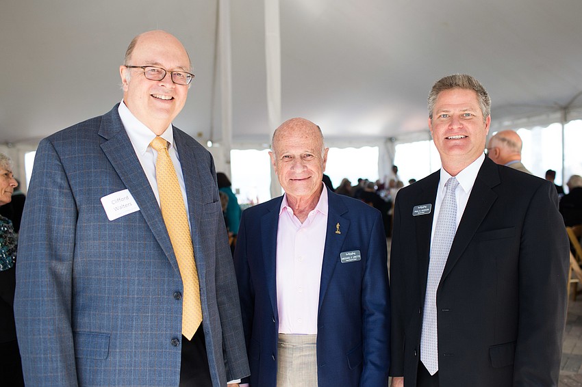 Cliff Walters, Mike Uertte and Board Chair and Honoree Paul Hudson