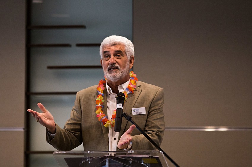 Emcee Skip Cohen welcomes the guests.