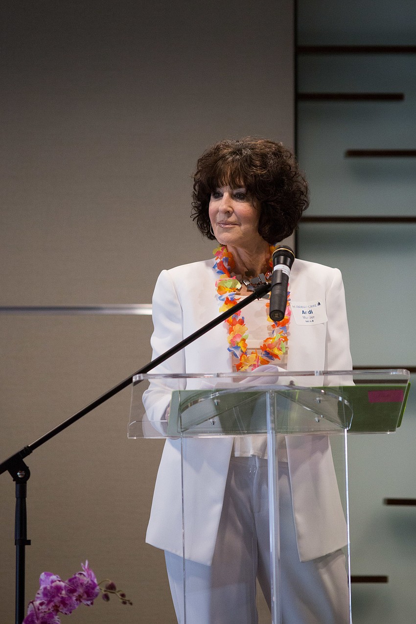 Co-Chairwoman Andi Munzer speaks.