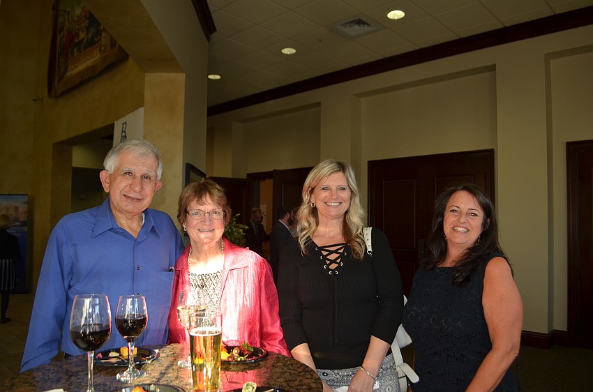 Country Club's Bill and Judy Pierhoples, Greenbrook's Cathy Marzetta and Barb Broadbridge show excitement to see the preview.