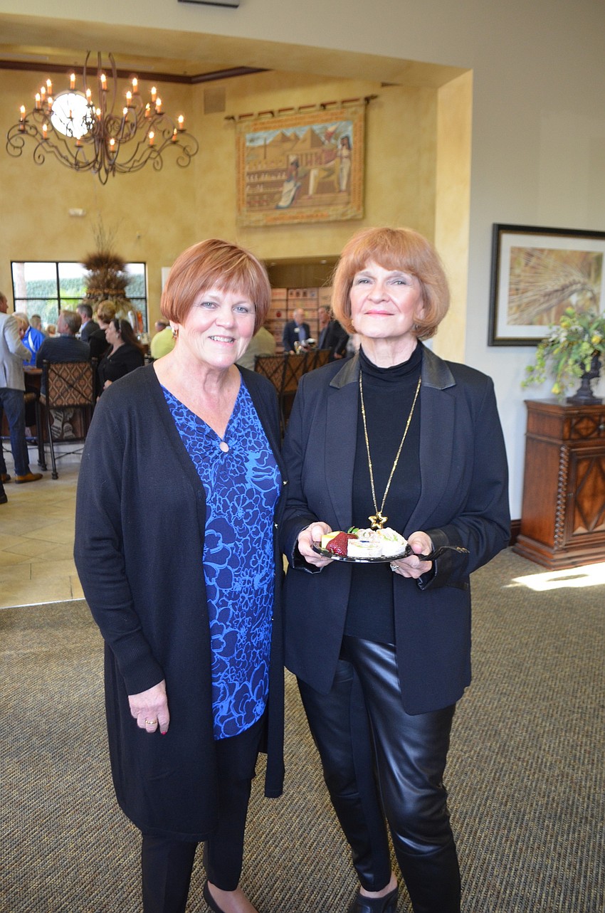 Donna Donato and Lenoire Bredt from Country Club like the food being offered at before and after the show.