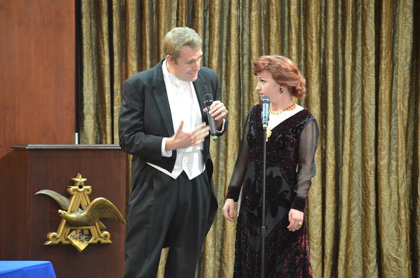 Christopher Kehoe and Vera Samuels sing a song to each other during the event.