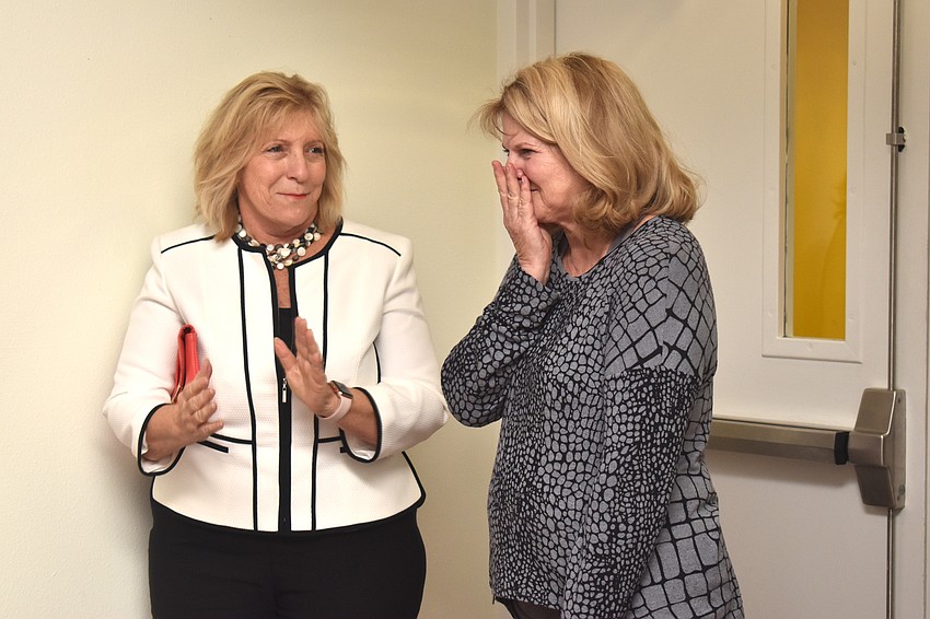 Jo Rutstein is all smiles and a few tears as she arrives at her surprise party.