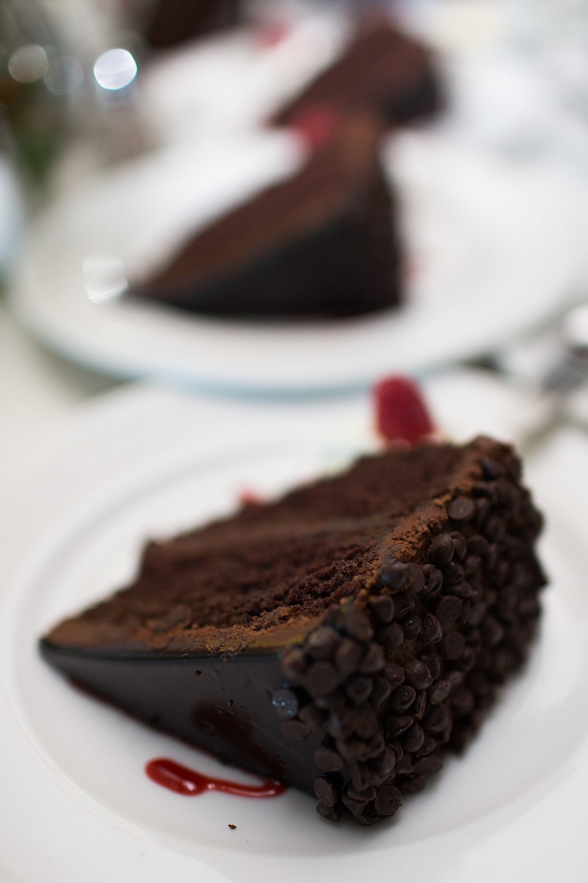 Chocolate cake with raspberries was served for dessert.