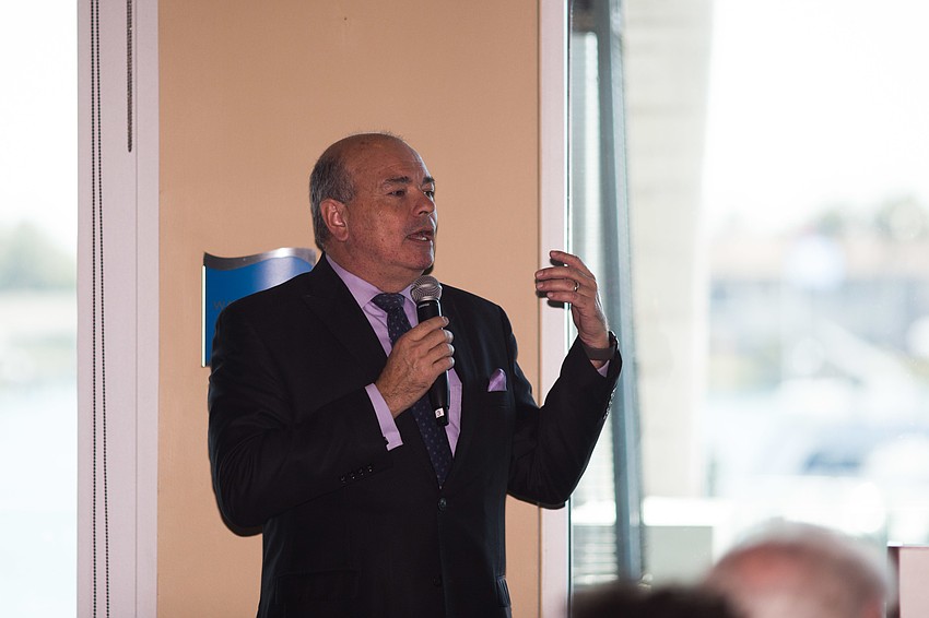 Executive Director Richard Russell jokes with Artistic Director Victor DeRenzi during the welcome.