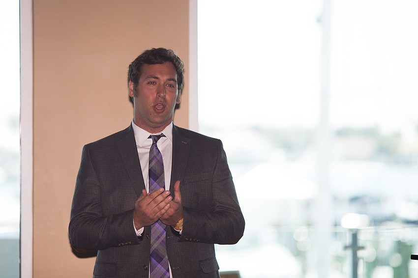 Returning Studio Artist award winner Stephen Martin performs for the audience.