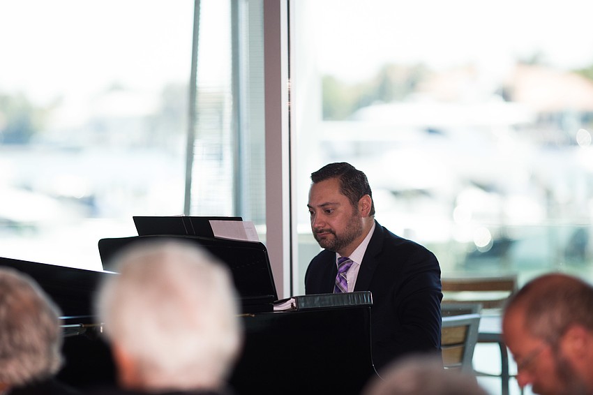 Steven Aguilò-Arbues accompanies Stephen Martin on the piano.