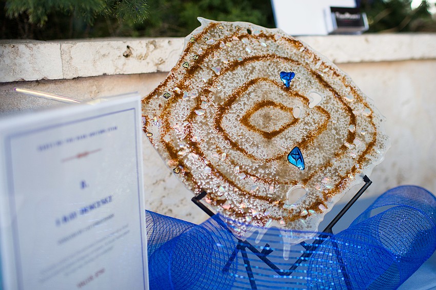 Many silent auction items centered around the sea and marine life.