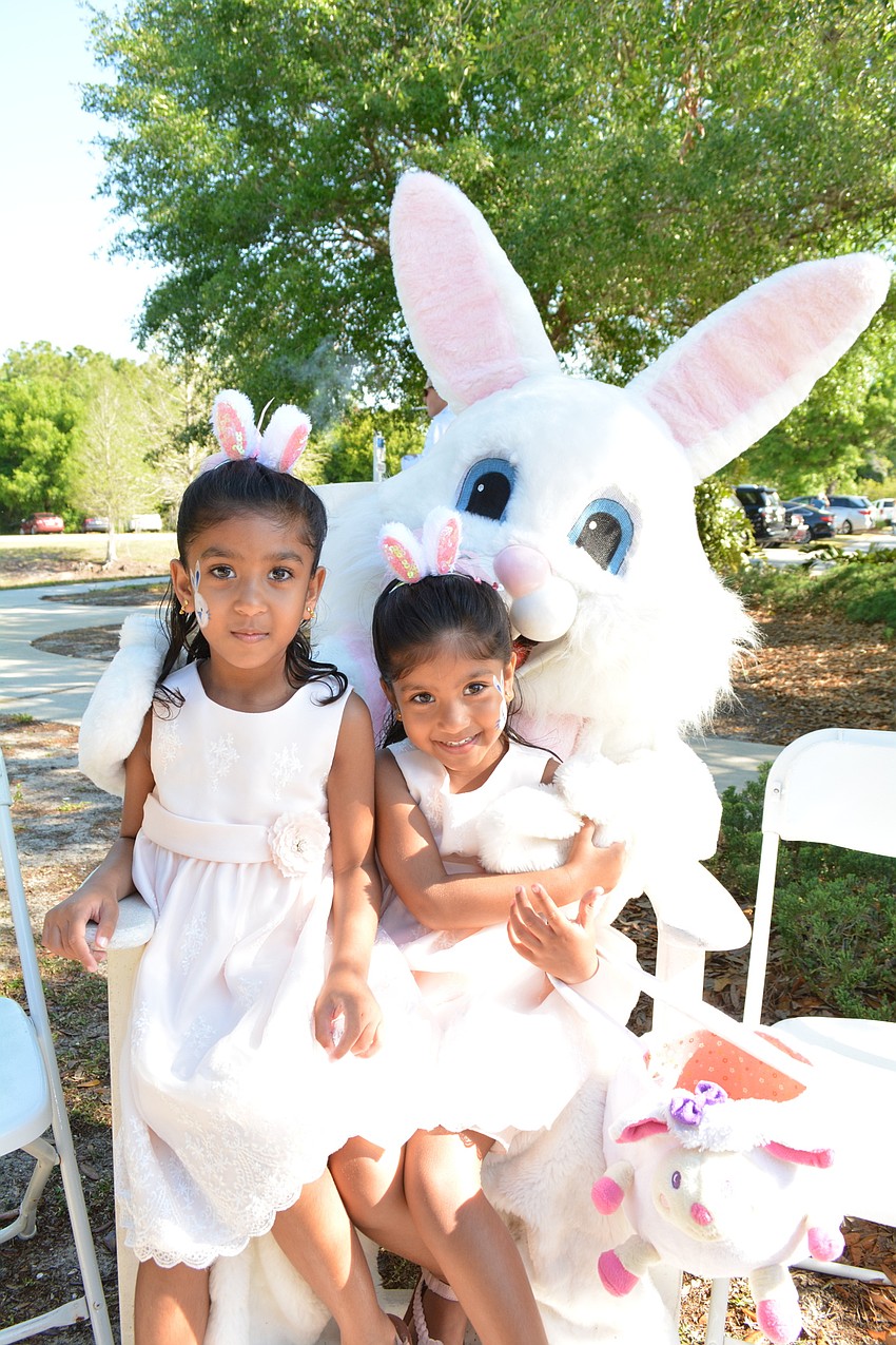 Greenbrook sisters Aaniya and Aaliya Mitta, make sure to get a picture with the Easter Bunny.