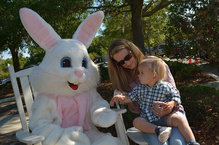 Greenbrook's Jodi Batsch is impressed her son Eason, 1, handles his first meeting with the Easter Bunny so well.