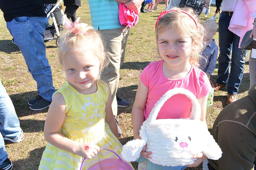 Barrington Ridge 5-year-old Leah Lear attends the hunt with 4-year-old Ava Gilbank, of University Place.