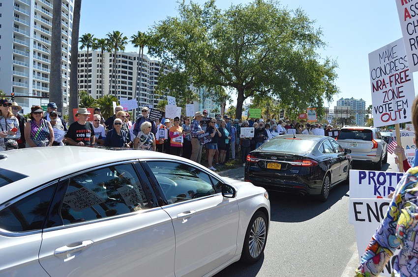 Protestors lined both sides of U.S. 41, and encouraged drivers to honk on their way past.