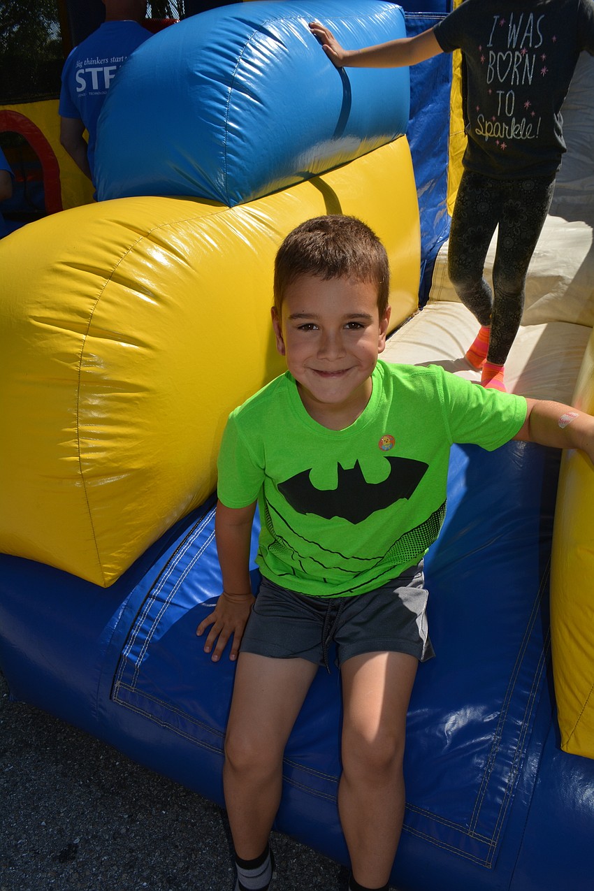 Six-year-old Jack Morrow, who attends Kidde Academy's after-school program, takes advantage of the bounce house.