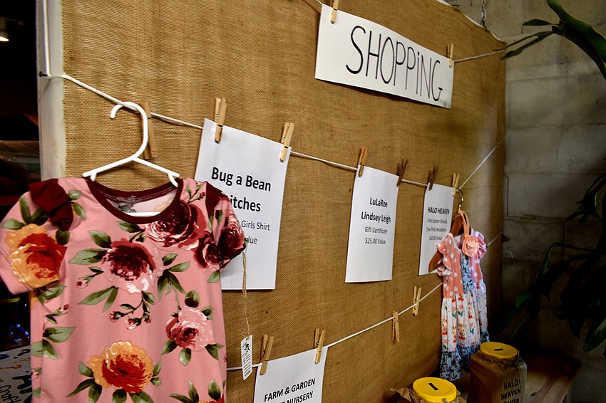 Following the egg hunt, participants put the raffle tickets they found in the eggs in various prize boxes.