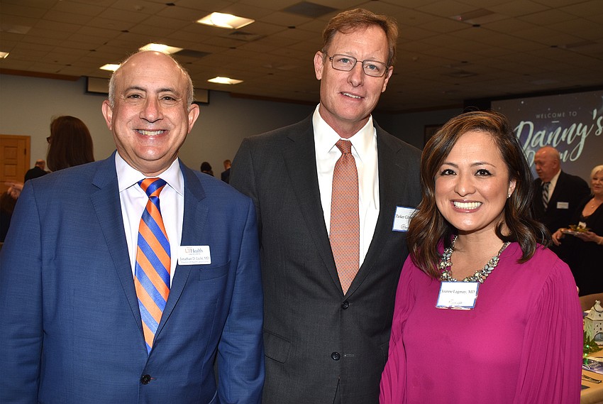 Drs. Jonathan Licht, Parker Gibbs and Joanne Lagmay from UF Health Cancer Center, where Dan DiNatale was treated.