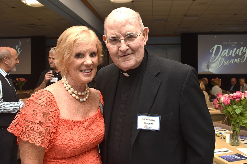 Sue DiNatale and Monsignor Gerry Finegan