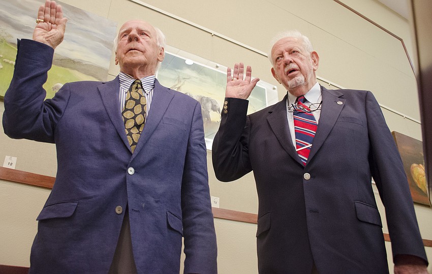 Vice Mayor Ed Zunz (left) and Mayor George Spoll are sworn into office.