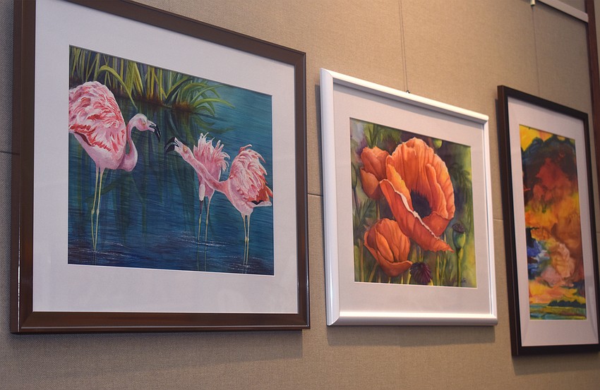Works by 10 local artist hang throughout town hall.