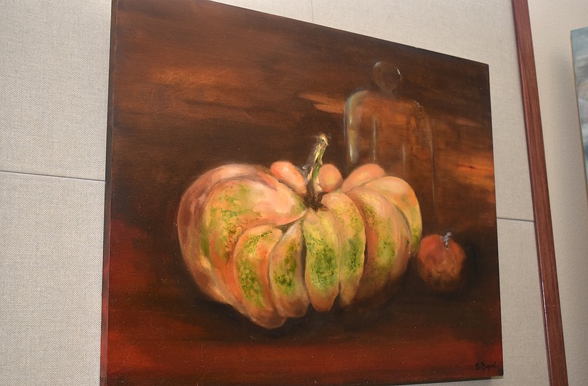 Works by 10 local artist hang throughout town hall.