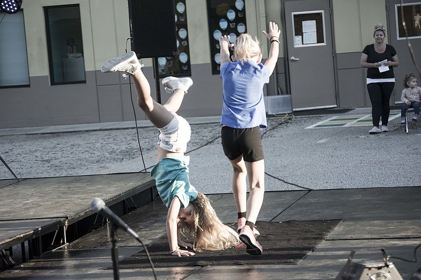 Approximately 30 students took turns showing off their talent at 