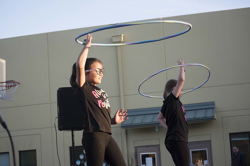 Alena and Ayanna Fernandez showed off their talent with a hula hoop.