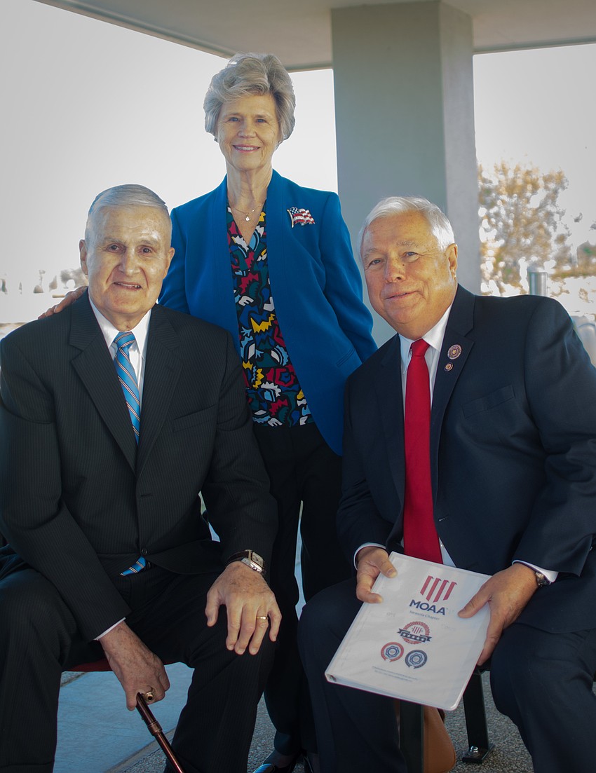 Gen. Hugh Shelton with his wife, Carolyn L. Johnson, and Brian McCarthy
