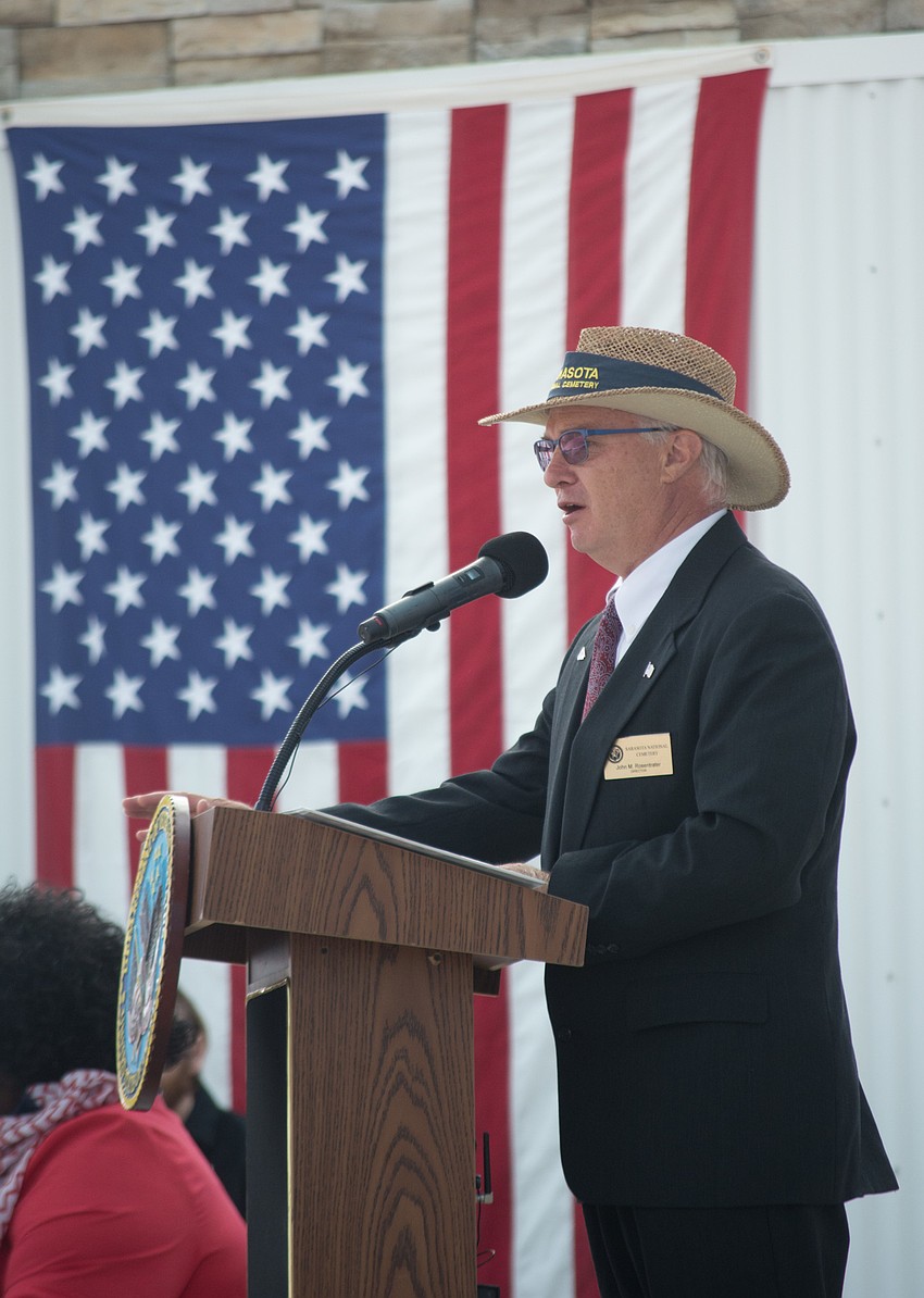 Director of the Sarasota National Cemetery John Rosentrater introduces the next speaker.