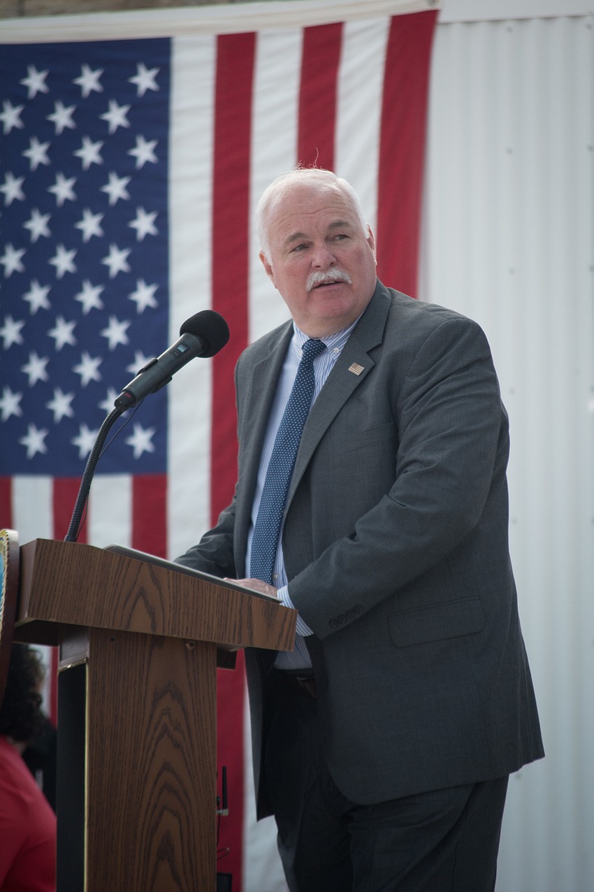 Under Secretary for Memorial Affairs  Randy Reeves introduces Gen. Hugh Shelton.