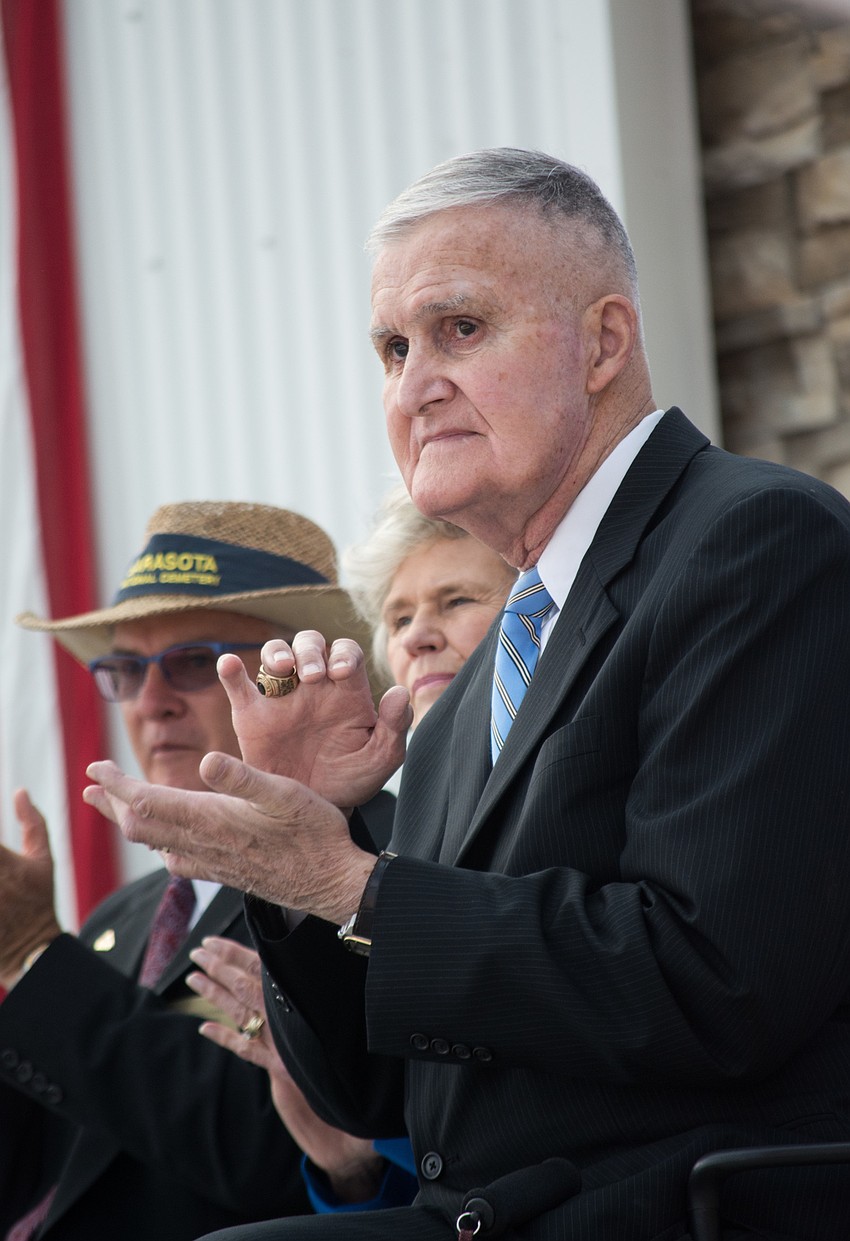 Gen. Hugh Shelton applauds the many veterans who attended the ceremony.