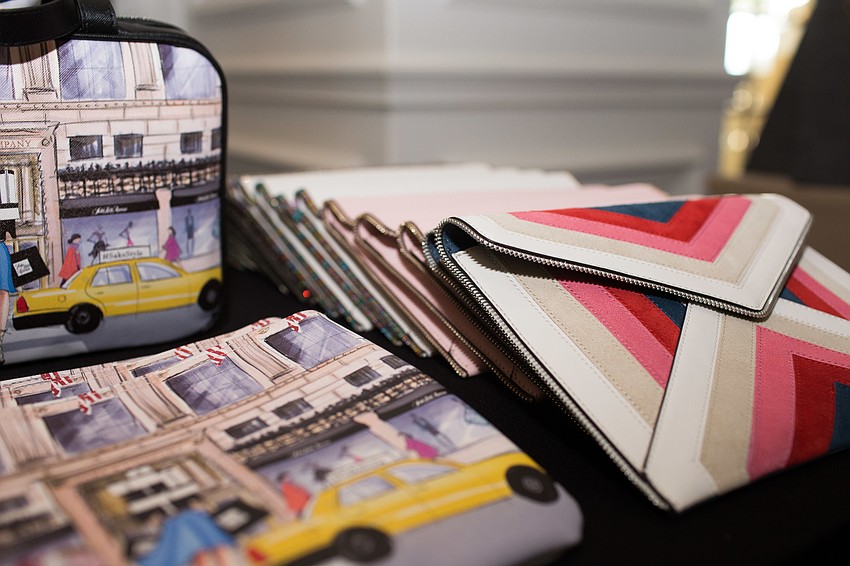 Saks Fifth Avenue displayed many different bags and clutches.