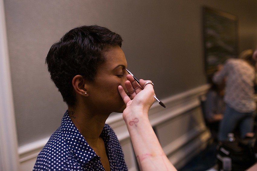 Victoria Bowers gets her makeup done for the runway.