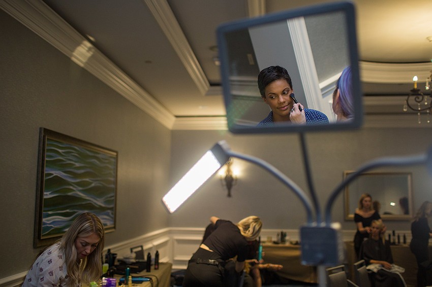 Victoria Bowers gets the finishing touches on her makeup done by Jess Marie Makeup.