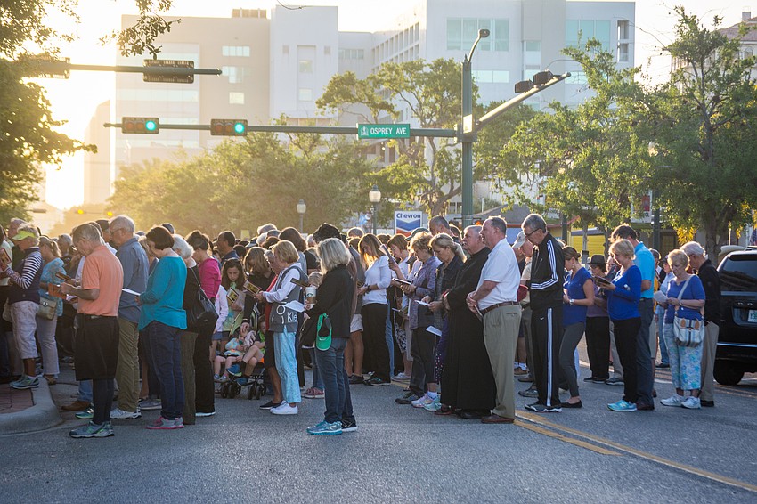 About 1,000 community members took part in the Good Friday walk.