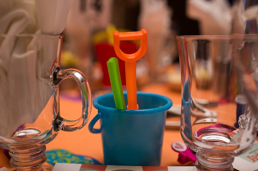 Tables were adorned with sand toys, sunglasses and bubbles.