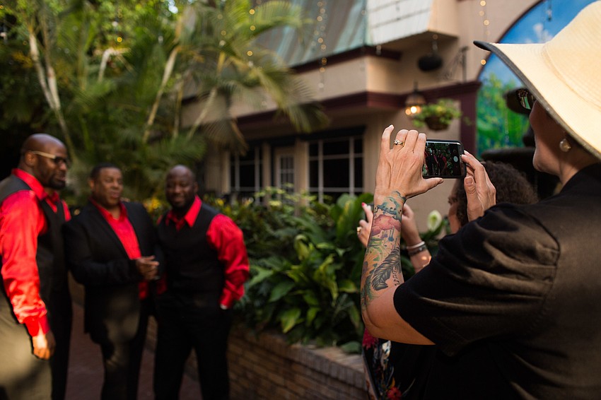 The Westcoast Black Theatre Troupe performers sing 