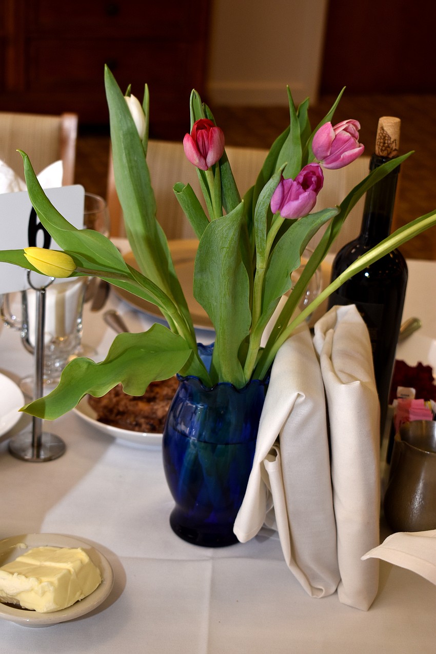 Tulip centerpieces adorned each table.