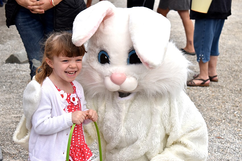 Anna Smith smiles with the Easter Bunny.