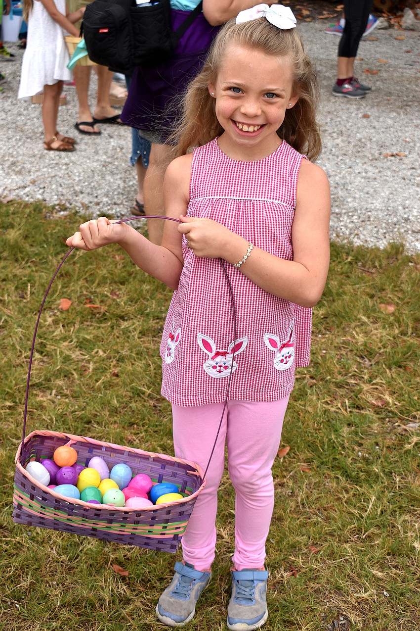 Lauren Taylor Nock shows off the eggs she found.