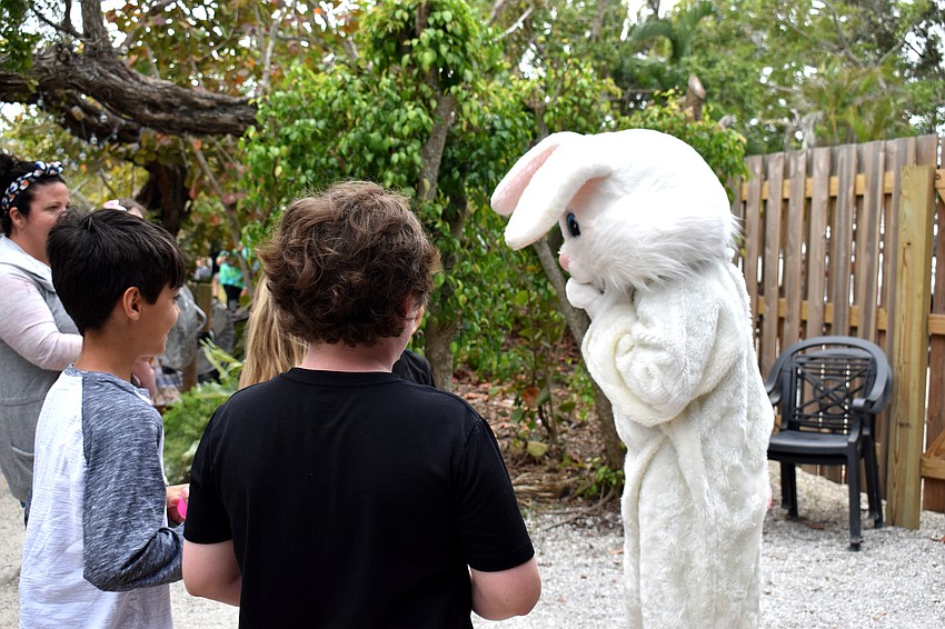 Kids ask the Easter Bunny for help finding the golden eggs.