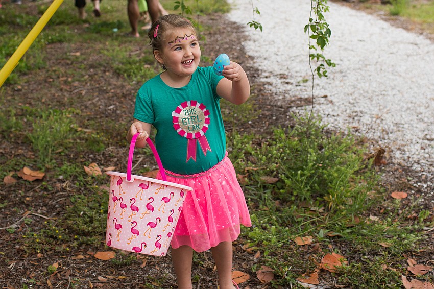 Ava Cartwright shows her parents the egg she found.