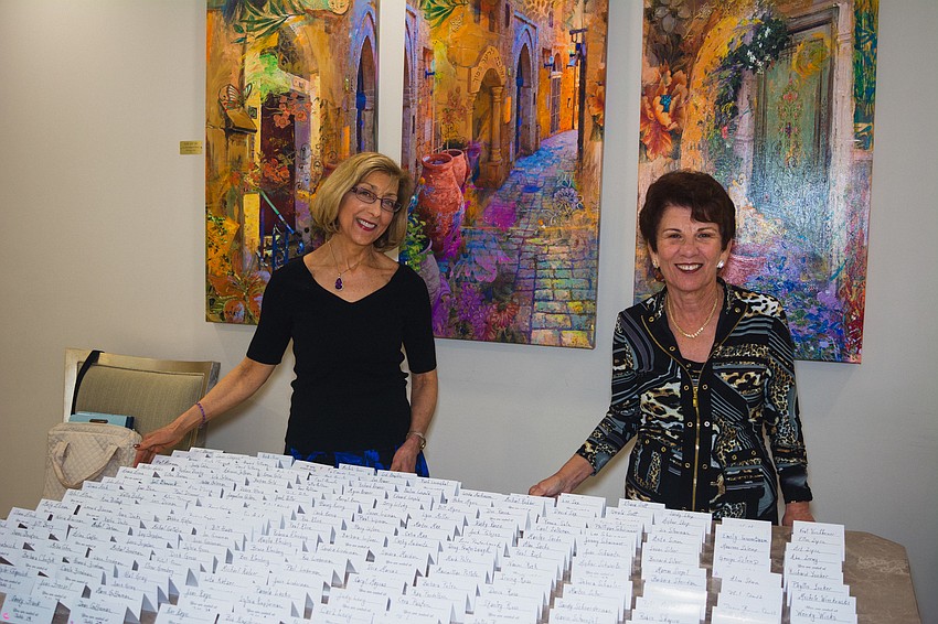 Jodi O'Beill and Rita Feder welcome guests.