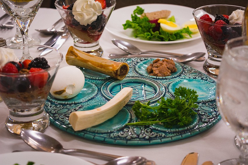 A traditional seder plate features foods that symbolizes the Passover story.