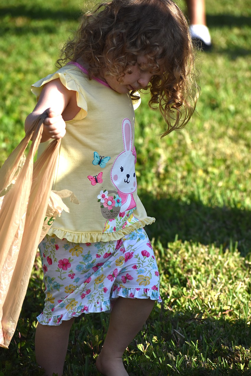 Anna Fitzpatrick searches for eggs.
