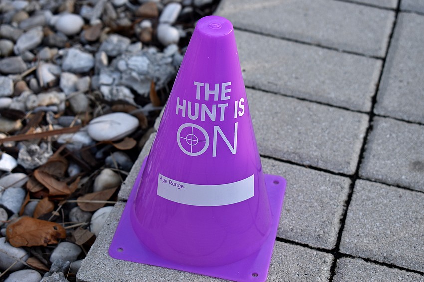 Kids followed multi-colored cones to get to the Easter egg hunt.